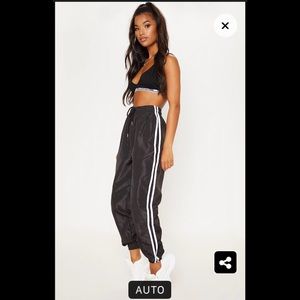 Black sweatpants with White Side Stripe